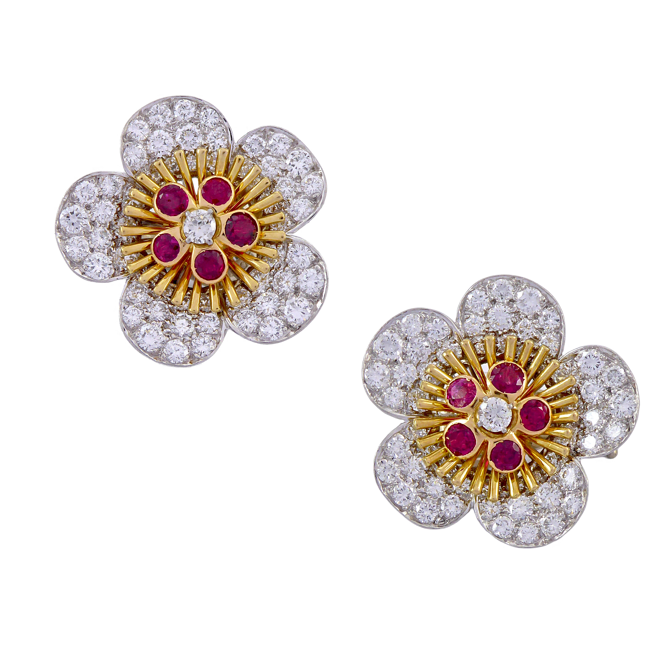 Pair of diamond and ruby five-petal flowerhead earrings by Van Cleef & Arpels, New York, made in France, each in the form of a cherry blossom,
